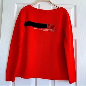This very good condition Ralph Lauren sweater comes with style, orange & black